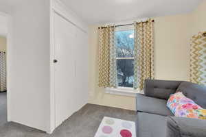 Sitting room with carpet floors