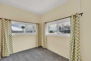 Unfurnished playroom featuring carpet