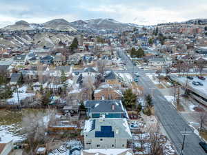 Snowy aerial view featuring a mountain view