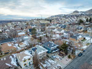 Birds eye view of property with a mountain view