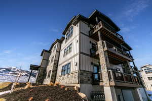 View of building exterior with a mountain view