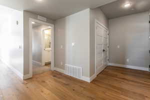 Hallway featuring light hardwood / wood-style floors