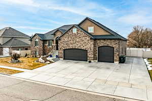 View of front of home with a garage