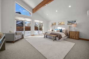 Bedroom with high vaulted ceiling, beam ceiling, access to outside, and carpet flooring