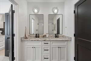 Basement Bathroom with vanity and walk in shower