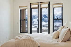 Primary Bedroom featuring a mountain view and access to outside