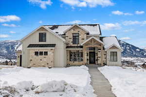 View of front of home featuring a mountain view