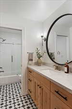 Full bathroom with vanity, shower / bath combination, and toilet