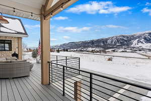 Covered deck with a mountain view