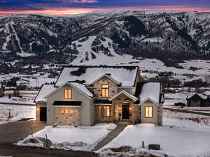 View of front of home featuring a mountain view