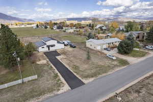 Birds eye view of property featuring a mountain view