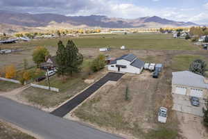 Birds eye view of property featuring a mountain view