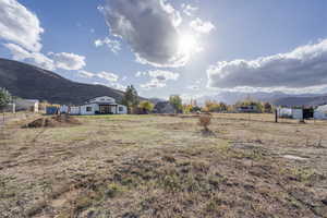 View of yard with a mountain view