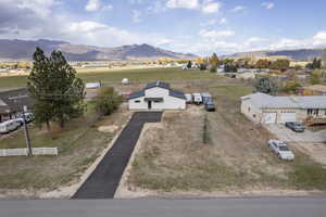 Drone / aerial view featuring a mountain view