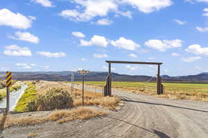 View of street with a mountain view and a rural view