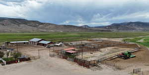 View of mountain backdrop featuring rural landscape