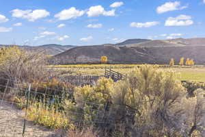 View of mountain feature with a rural view