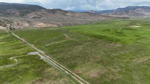 View of mountain background featuring rural landscape