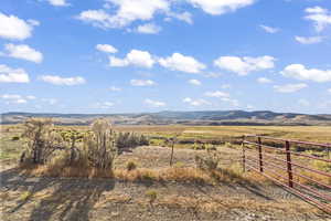 View of mountain feature with a rural view