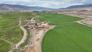 Overview of rural landscape with a mountainous background