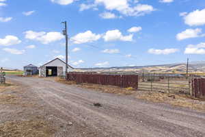 View of street featuring a mountain view and a rural view