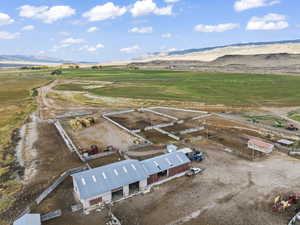 Aerial view featuring a mountain view and a rural view