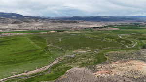 View of mountain background featuring rural landscape