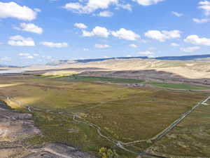 Drone / aerial view with a mountain view and a rural view