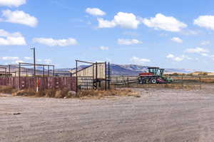 View of yard featuring a mountain view and a rural view