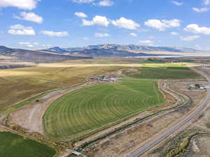 Drone / aerial view with a mountain view and a rural view