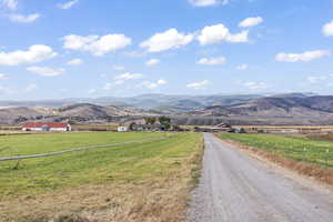 Property view of mountains with a rural view