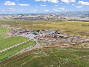 Drone / aerial view with a mountain view and a rural view