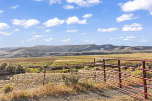 Property view of mountains featuring a rural view