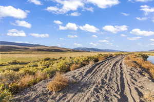 Property view of mountains featuring a rural view