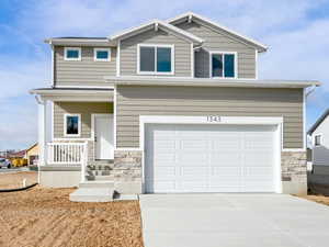 View of front of house featuring a garage