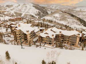 Snowy aerial view with a mountain view