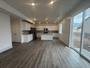 Kitchen with included Refrigerator