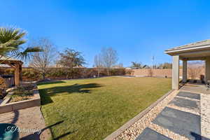 View of yard with a patio