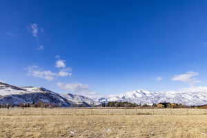 View of mountain feature with a rural view