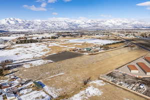 Snowy aerial view with a mountain view