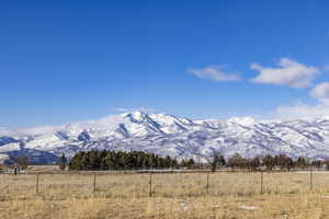 Property view of mountains featuring a rural view