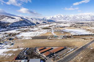 Snowy aerial view with a mountain view