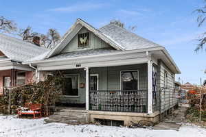 Bungalow-style house with covered porch