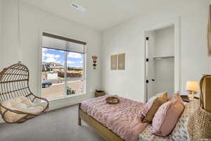 Bedroom featuring carpet