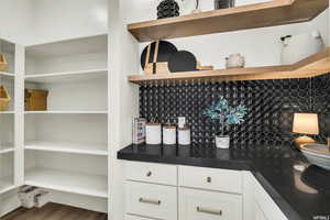 Interior space featuring dark hardwood / wood-style floors