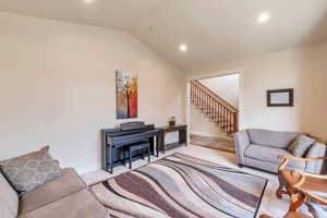 Living room with lofted ceiling