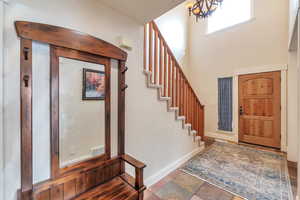 Entrance foyer featuring an inviting chandelier