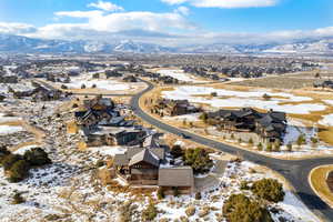 Snowy aerial view with a mountain view