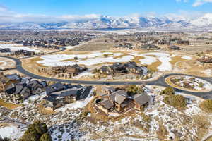 Snowy aerial view with a mountain view