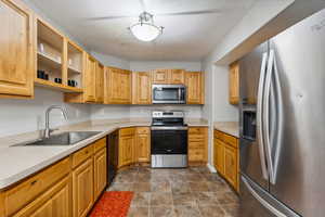 This large kitchen offers lots of cabinet and counter space, as well as upgraded appliances!